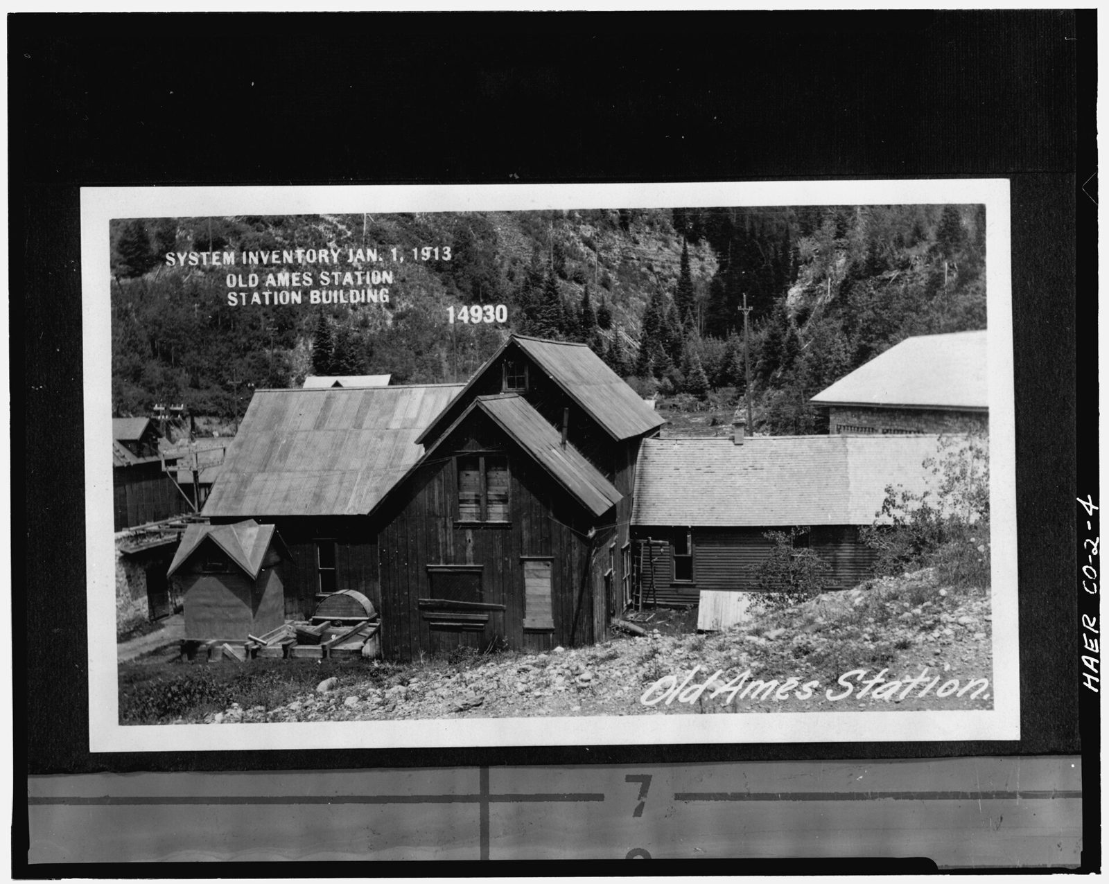 Exterior view (c.1913) of 1895 power house, roof of 1905 power house is visible in right side of photo.