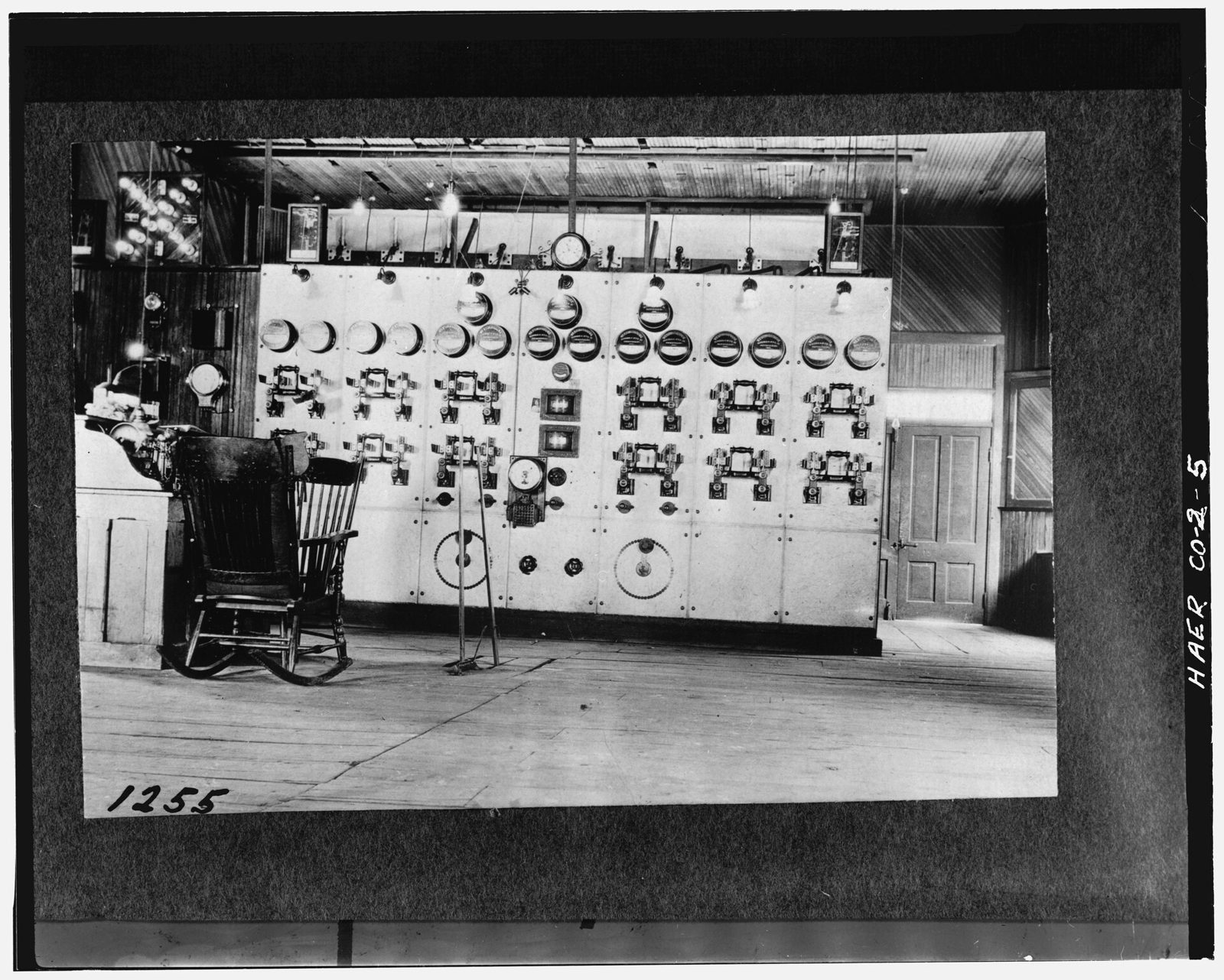 Interior view (c.1900) of 1895 power house showing switchboard.