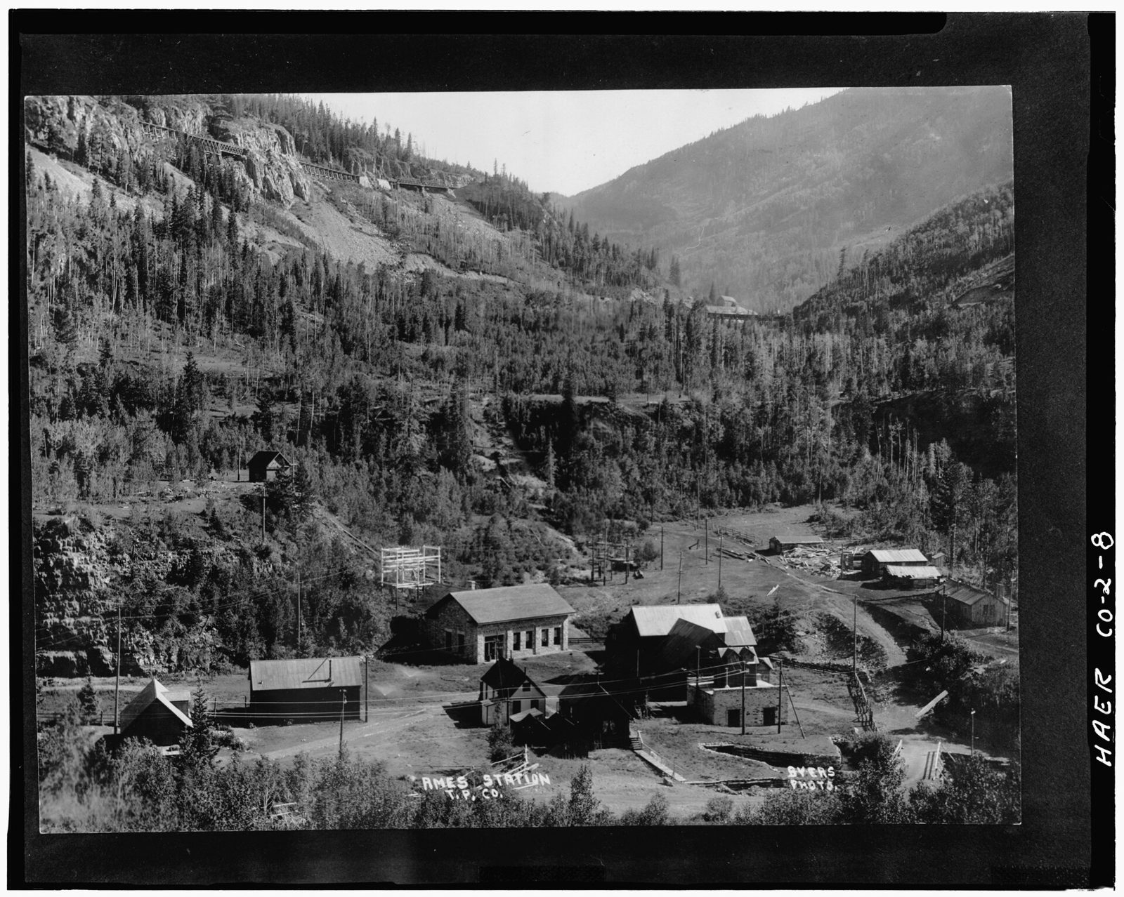 General view of ames power station. 1905 power house at center of photo, 1895 power house to right of 1905 power house.
