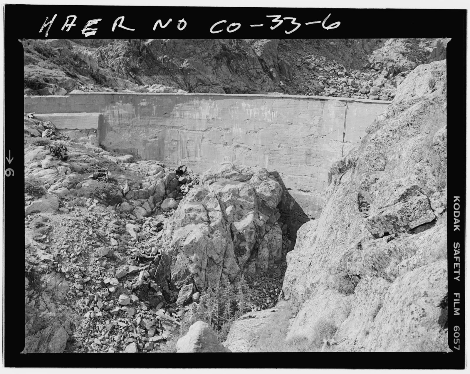 Bluebird Dam, front, with part of gorge outlet. Viewing southwest.