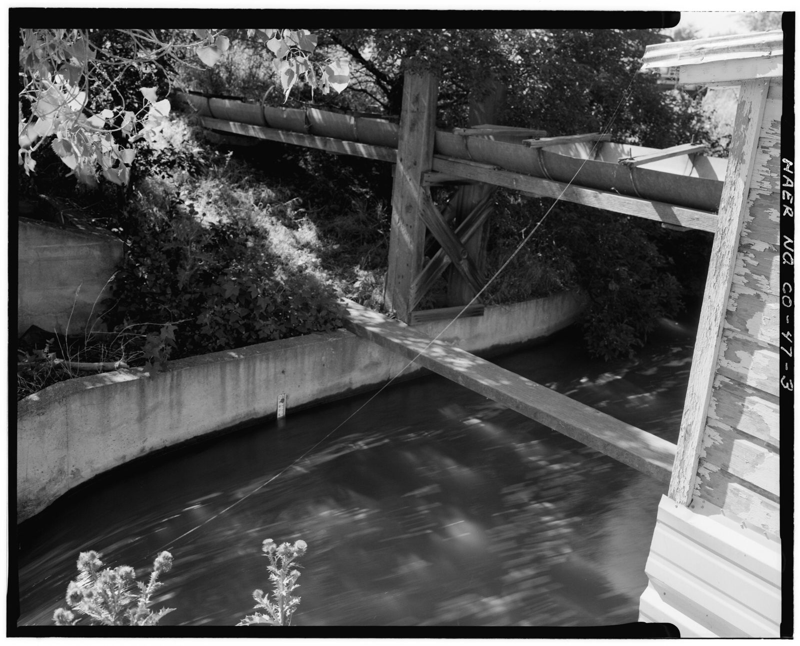 Brantner Ditch parshall flume and measuring device Part of the clock house can be seen on the right.