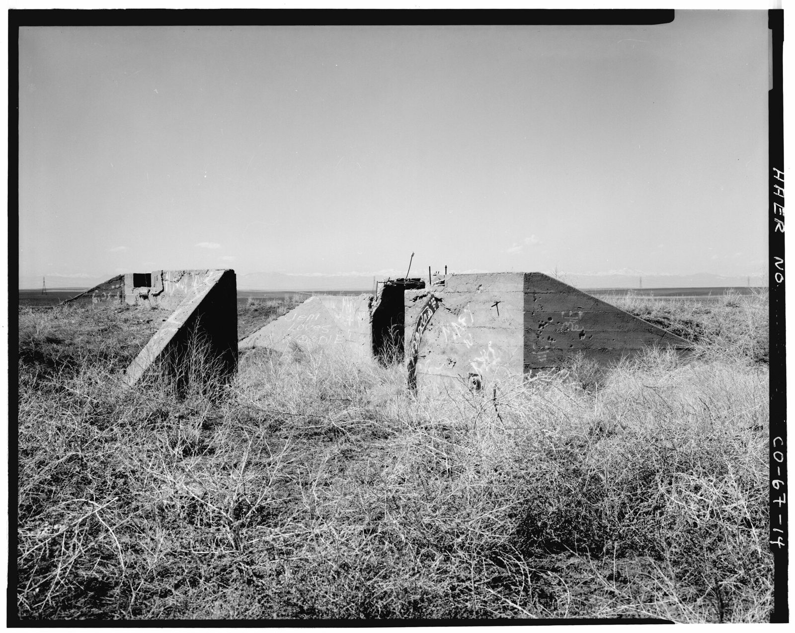 View of lateral E with headgate, looking west.