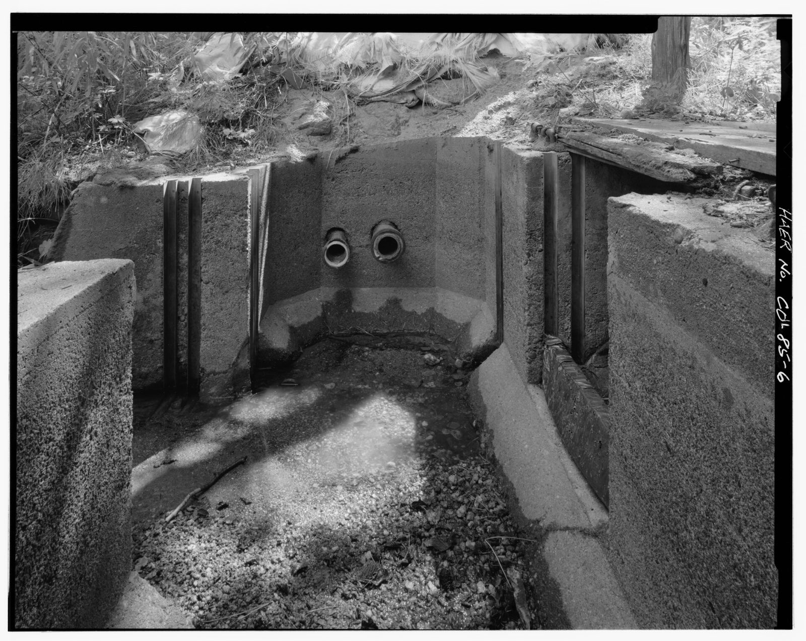 Gates 3, 4, and 5, intake channel looking east; Water that passed into pipes entered settling vault.