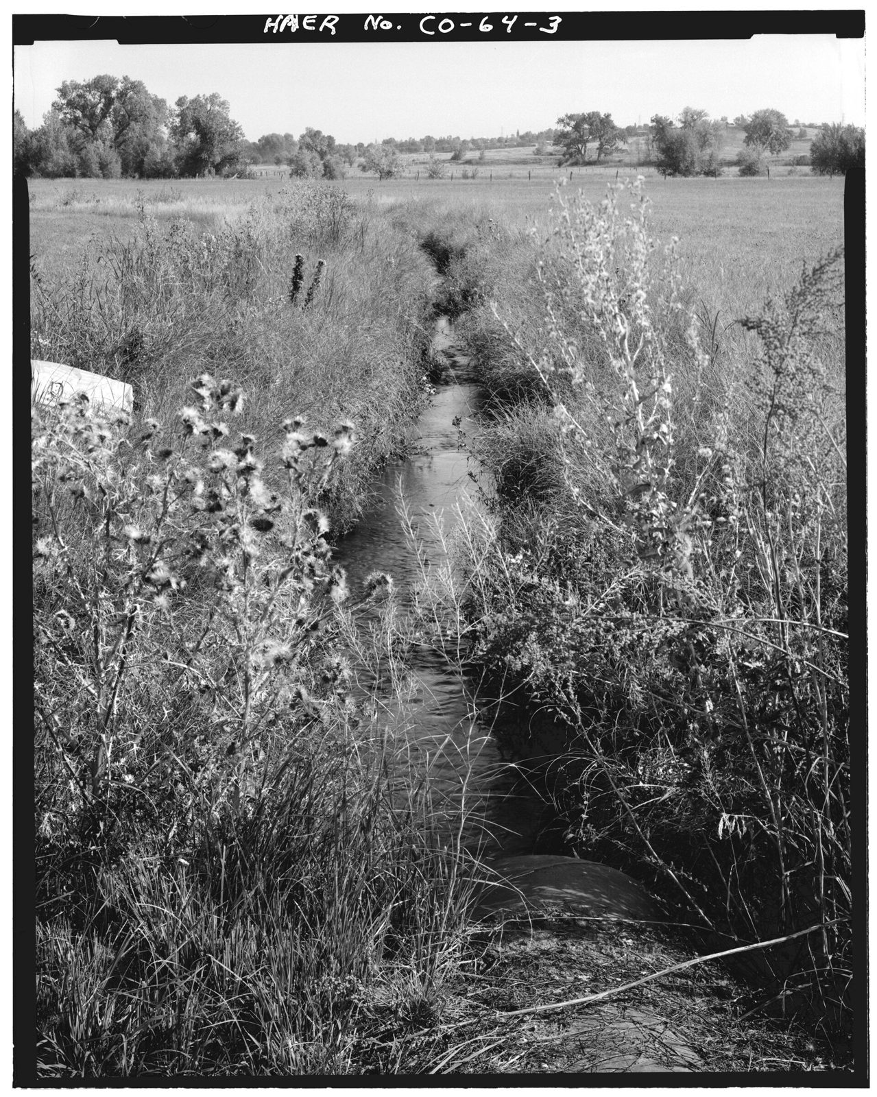 View looking north at culvert to allow road passage over ditch.