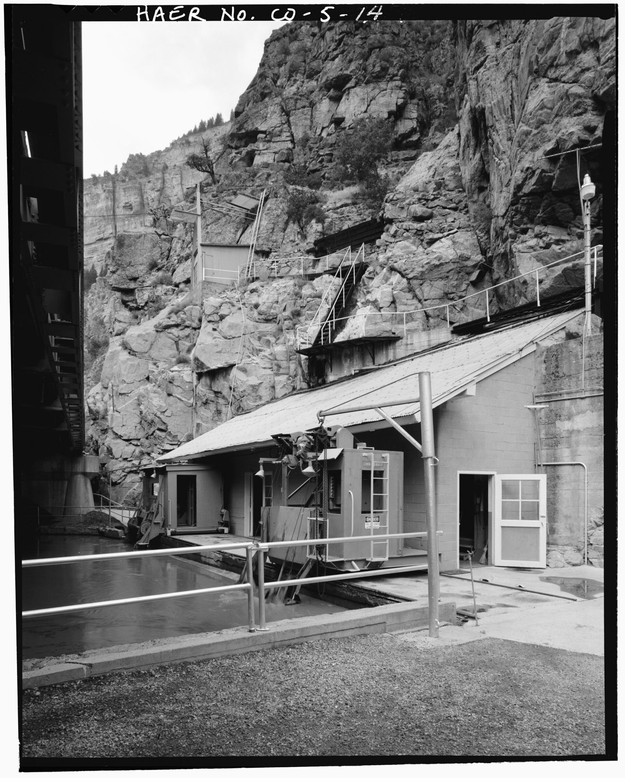 Gate house to diversion tunnel, south and east elevations, view to the west. Hoist house is seen above gate house.