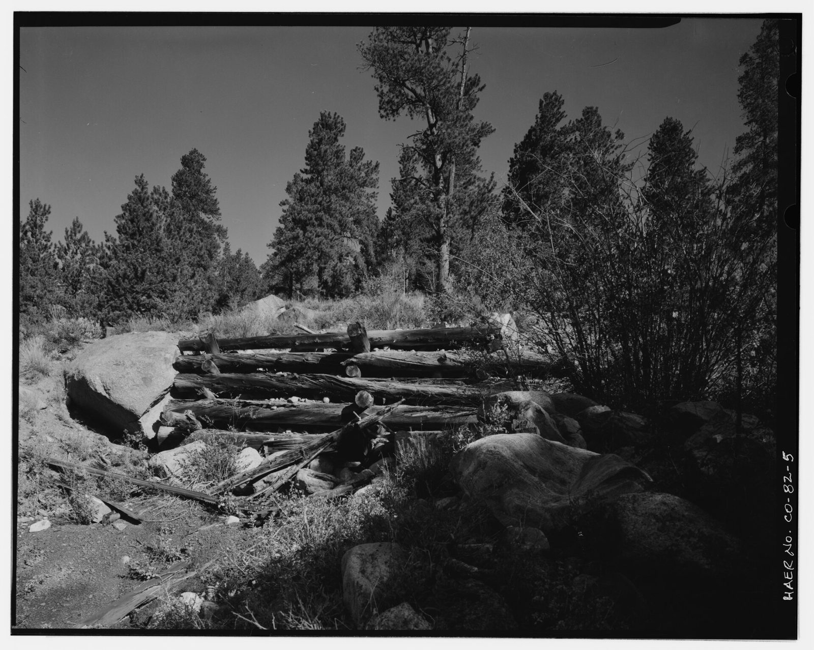 Log cribwork installed to repair breach in canal. View is to the north-northwest.