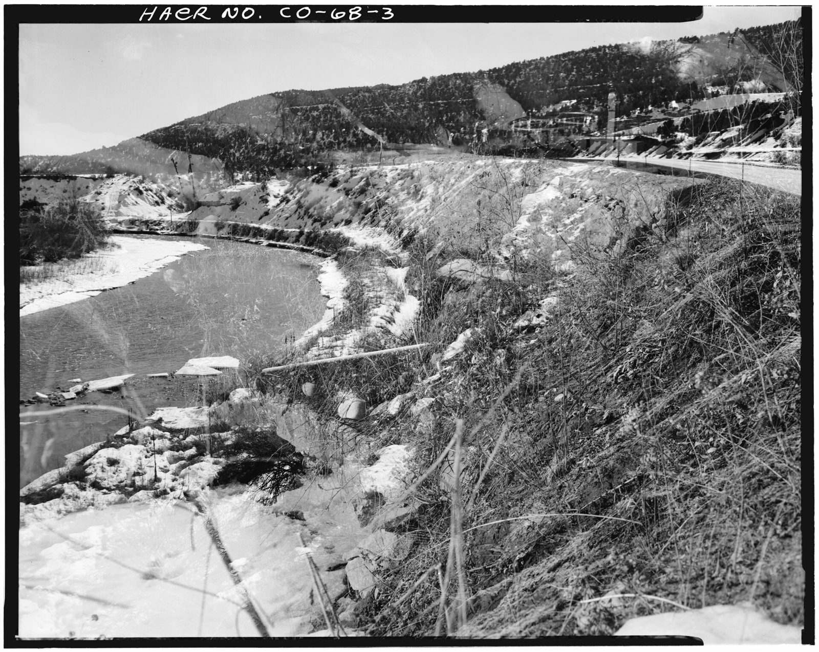 View of earth-covered ditch, looking southwest.