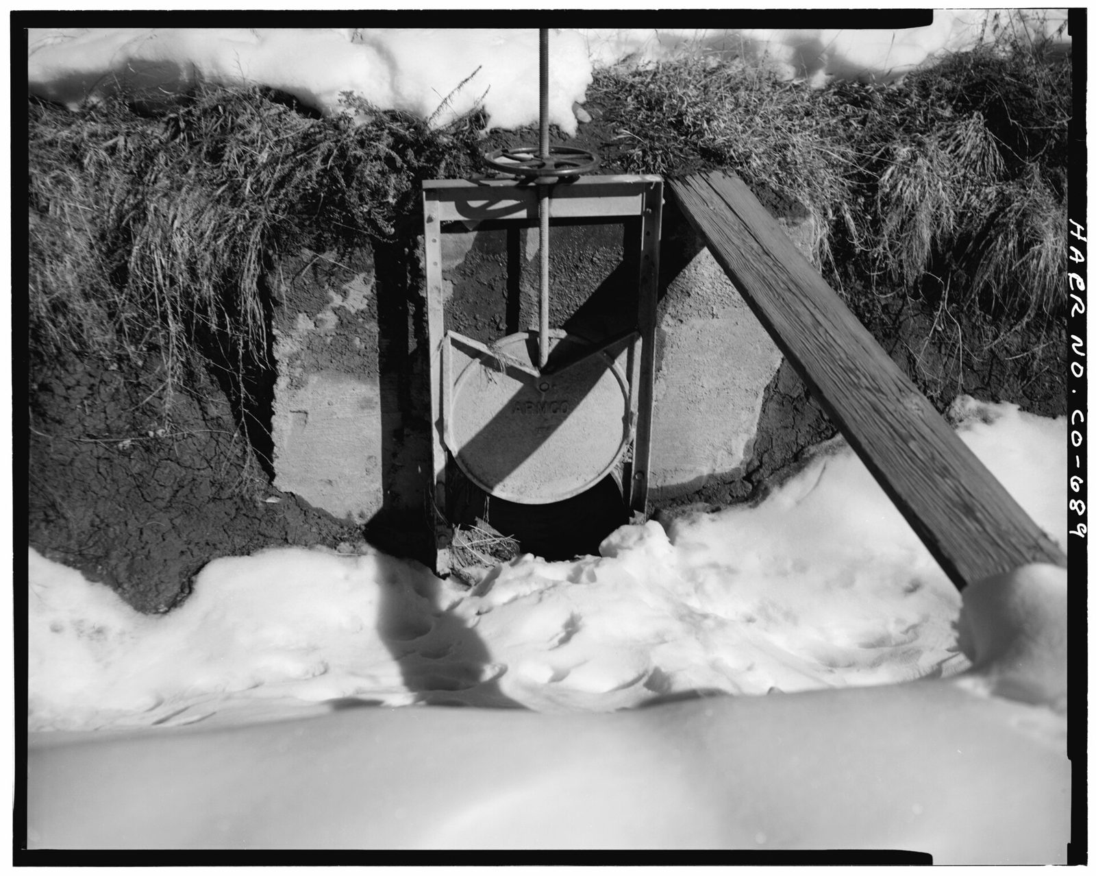 View of ditch sluice gate, looking east.